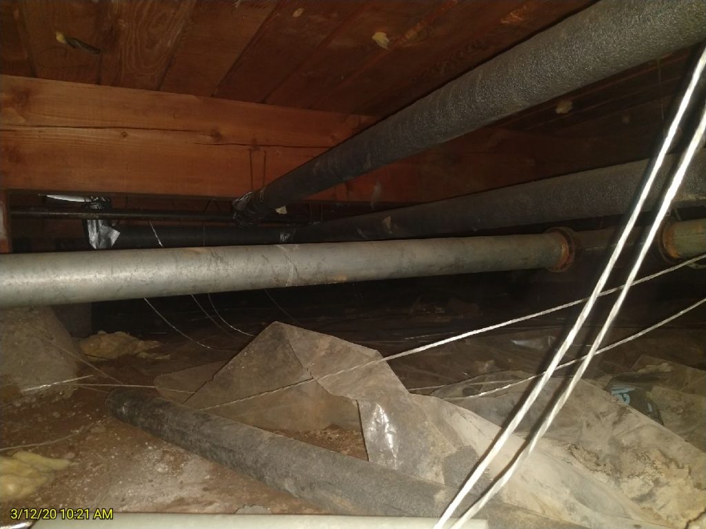 Crawlspace needing vapor barrier replacement